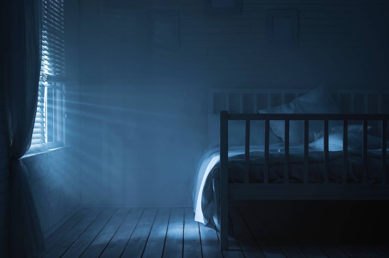 A bedroom with light coming through the window onto the bed at Blindscapes near Albuquerque, NM